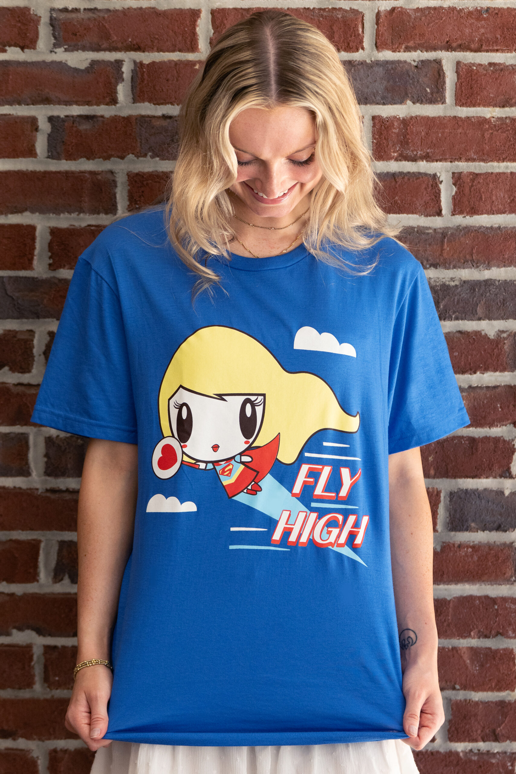 Young woman wearing the Fly High Lolligag T-shirt