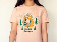 A girl wearing a Lolligag Happy Camper T-shirt