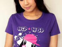 A girl looking down wearing the Hip-Hop Hooray Lolligag Tee