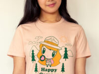 A girl wearing the Lolligag Happy Camper Adult T-shirt