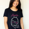 A girl laughing wearing the Dancing Hearts Lolligag Tee