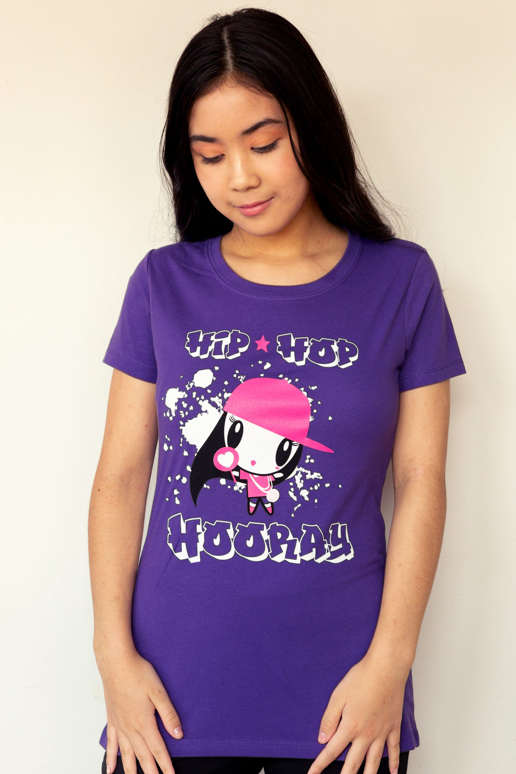 A girl looking down wearing the Hip-Hop Hooray Lolligag Tee