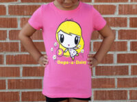 Girl staring at the Oops A Daisy Lolligag T-shirt