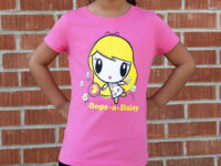 Girl with hands on her hips wearing the Oops A Daisy Lolligag T-shirt