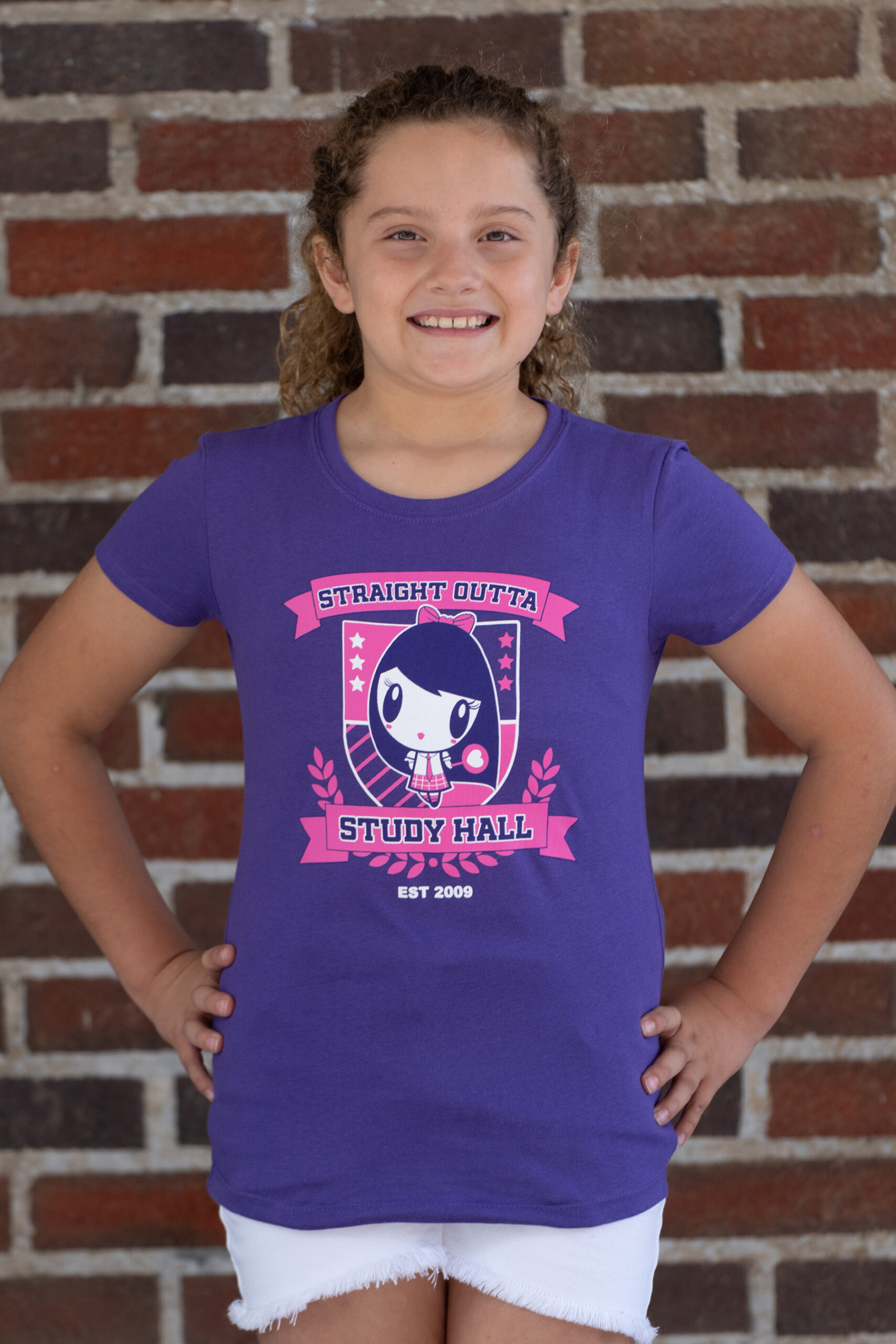 Girl wearing the Lolligag Straight Outta Study Hall Kids Tee