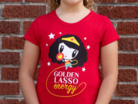 Girl wearing the Golden Lasso Energy Lolligag kids T shirt