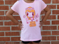 Girl with arms on her hips wearing the Wild Child Lolligag Tee