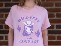 Millennial wearing the Wild, Free and Country Lolligag Tee