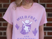 Woman wearing the Wild, Free and Country Lolligag T shirt