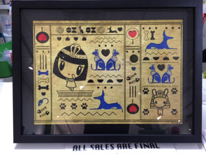framed Egyptian Lolligag art piece for an art show at QPop